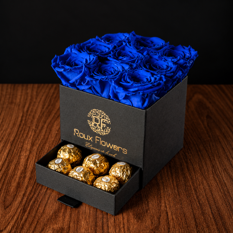 Estuche de 9 rosas eternas azul rey con chocolates Ferrero y envío a todo México