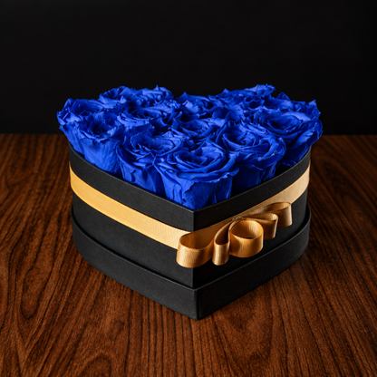Arreglo de 13 rosas eternas color azul en caja tipo corazón con envío a todo México
